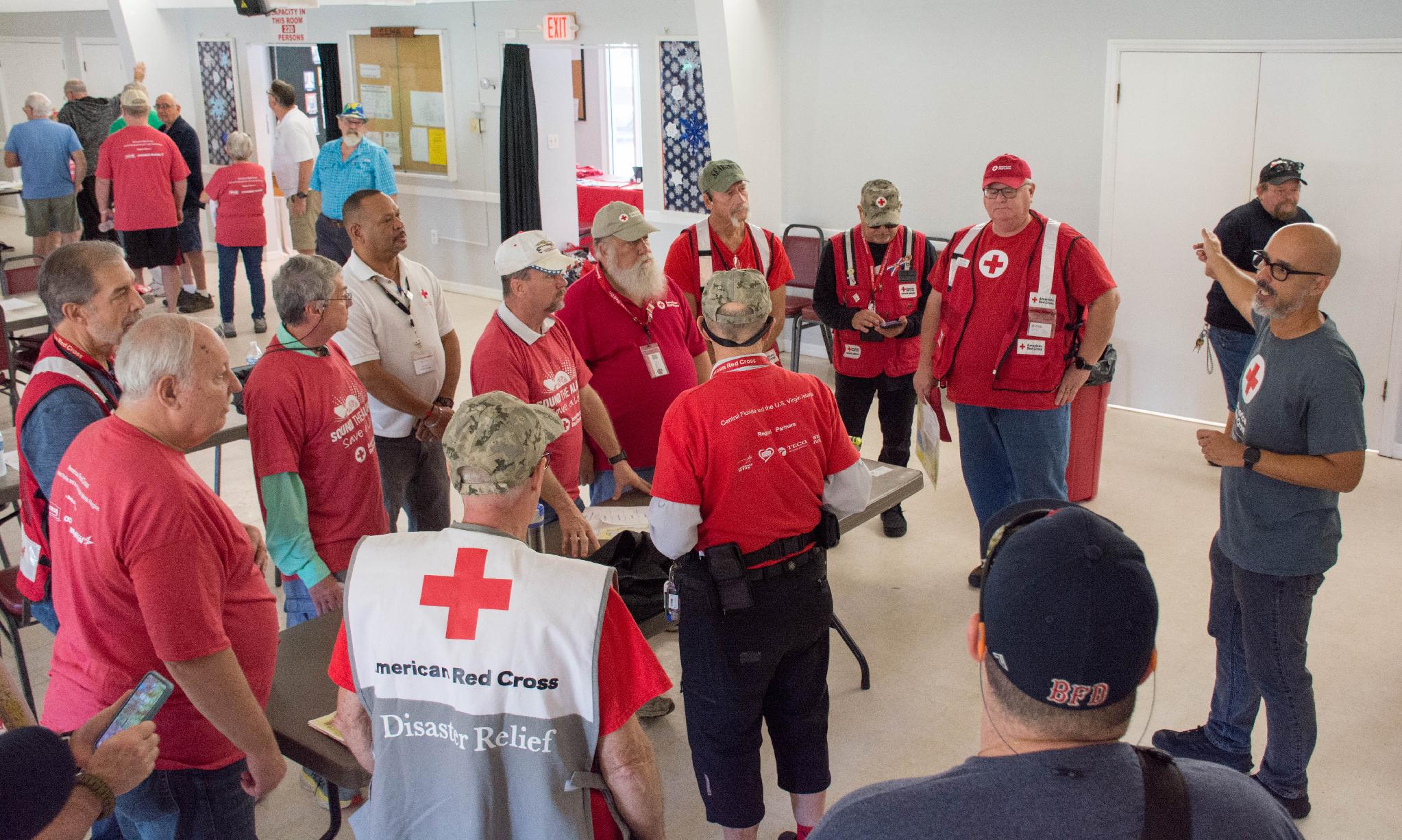 Red Cross volunteers gathered for a briefing